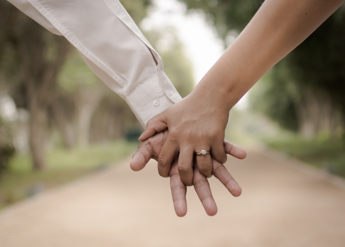 an image of 2 hands holding together