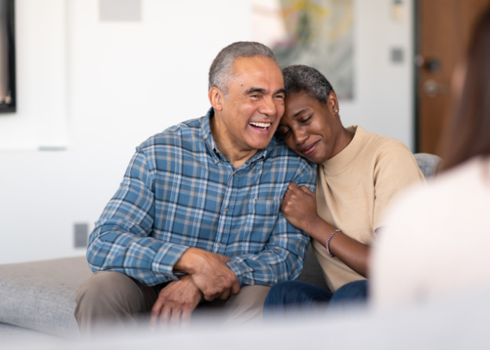 an image of an old couple laughing