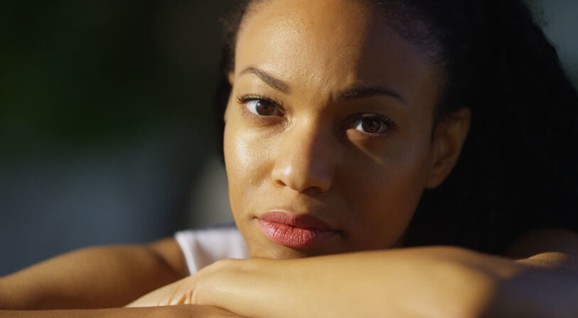 an image woman looking at the camera